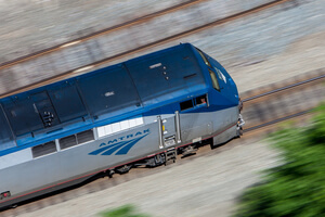 An aerial view of a train moving fast